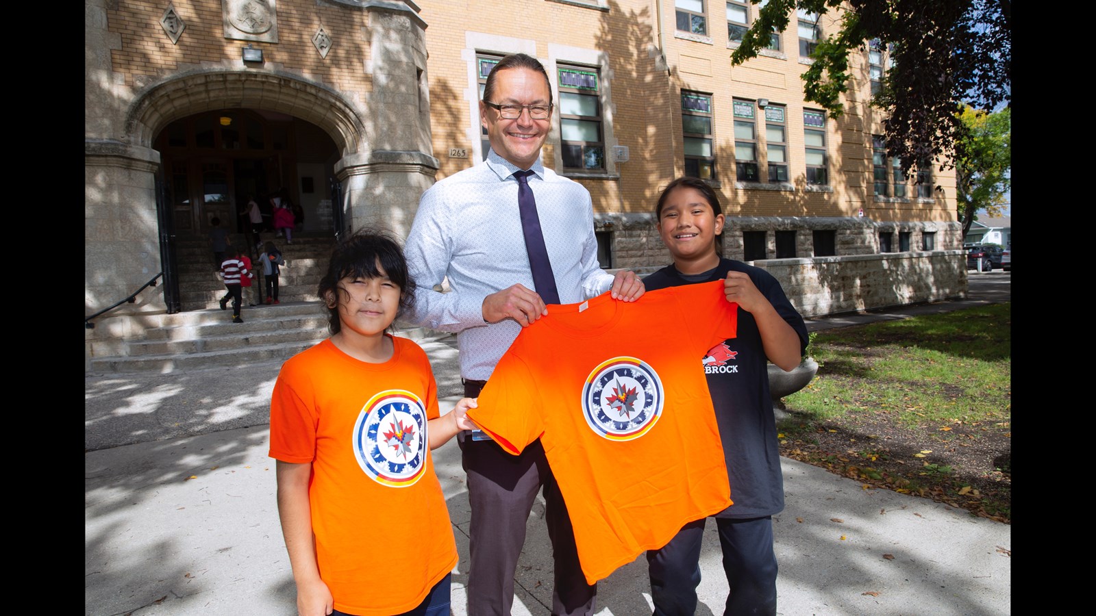 Isaac Brock students with just some of the orange shirts they shall be wearing on Nov. 29 in honour of residential school survivors and victims.
